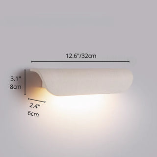 Dimensions of the white wall light 12.6"x3.1"x2.4"(32cm x 8cm x 6cm) shown with warm LED glow