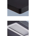 Macro view of rounded corner of black aluminum frame showcasing clean minimalist design