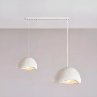 minimalist two-pendant ceiling light with white textured wabi-sabi shades hanging above a soft beige background, modern home lighting design