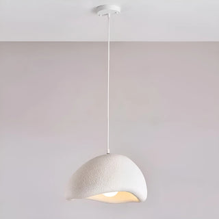 single white pendant light with curved asymmetrical shape, soft warm illumination, and modern minimalist design