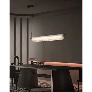 Luxury marble and brass chandelier by MIRODEMI suspended above a contemporary dining table, showcasing warm ambient light and modern interior elegance