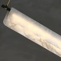Detail shot of the Almeria chandelier’s handcrafted marble shade with natural veining and soft LED diffusion for ambient luxury lighting