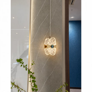 Baiardo pendant light against a marble wall