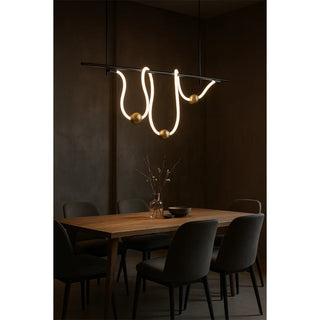 MIRODEMI modern irregular LED chandelier with glowing silicone curves and gold spheres above a warm wooden dining table in a dark minimalist interior