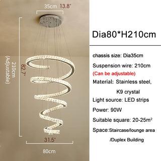 Long spiral crystal chandelier in warm 3000K light for dining room