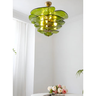 Mirodemi Lunaria layered glass disc chandelier in green glass hanging in a bright modern room