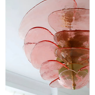 Close-up detail of the Mirodemi Lunaria layered pink glass disc chandelier with brass hardware