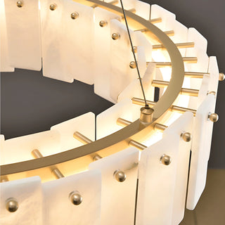 Close-up of copper frame and marble panels on Mirodemi Cloudstone chandelier – handcrafted luxury detail