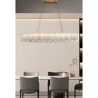 Contemporary dining room interior with Mirodemi marble oval chandelier and minimalist furniture