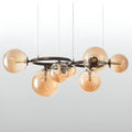 Amber glass globe chandelier with LED bulbs and circular metal structure