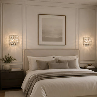 Pair of modern Murano glass wall sconces installed in a luxury bedroom interior with warm ambient lighting