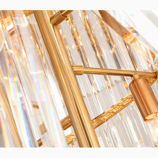 Shimmering crystal detail of a grand gold cascade chandelier