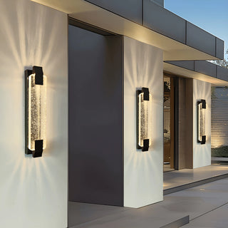 Luxury black crystal wall sconces on a modern home's entryway