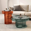 Modern colored glass coffee table and side table set in luxury interior