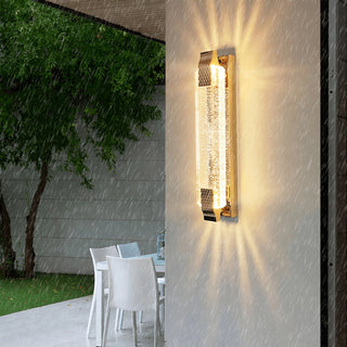 Crystal LED outdoor wall light glowing in the rain – waterproof design