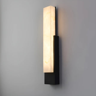 Front angle of the modern marble-look LED sconce in black finish with illuminated faux alabaster panel