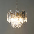 Modern Murano glass pendant chandelier with layered textured glass and warm lighting.