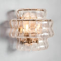 Front view of a clear Murano glass wall sconce with handcrafted textured glass and contemporary Italian design