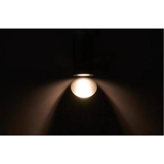 DAWN Series outdoor wall light in black finish demonstrating light effect in a dark environment