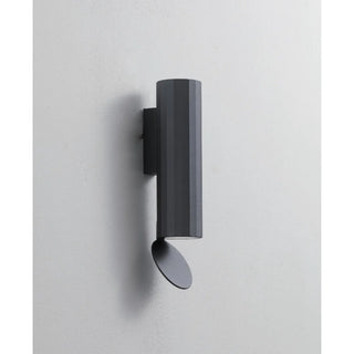 Side view of the DAWN Series modern outdoor wall light in matte black, mounted on wall