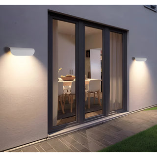White Modern Outdoor Wall Lights installed on both sides of glass patio doors for warm outdoor illumination