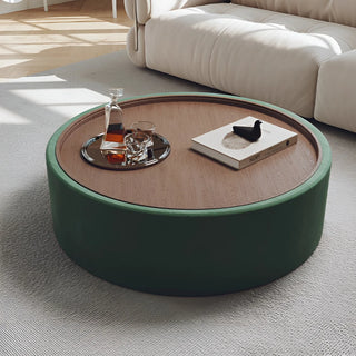 Green round coffee table with walnut veneer surface, Italian sanded fabric body, and hidden storage