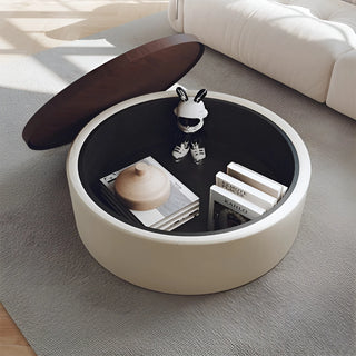 Modern round coffee table with lift-top storage, walnut veneer surface, and Italian sanded fabric body in white