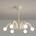 Cream modern chandelier with six curved arms and glass globe bulbs, minimalist bedroom ceiling light