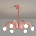 Modern sculptural chandelier in pink finish with six curved arms and white glass globe bulbs, contemporary ceiling light