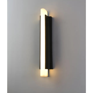 Outdoor wall light turned on, front view with warm LED illumination
