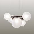Modern white glass globe chandelier with matte spherical shades and dark metal frame