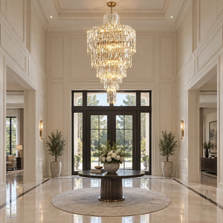 Moneglia custom gold crystal chandelier in a grand foyer with an 18-foot ceiling