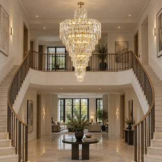 Moneglia custom crystal chandelier centered in an open staircase void with a 20-foot ceiling