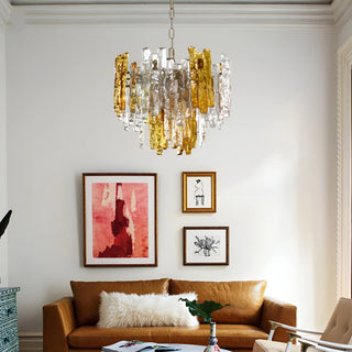 Luxury Murano glass chandelier with clear and amber textured glass in an elegant modern living room interior