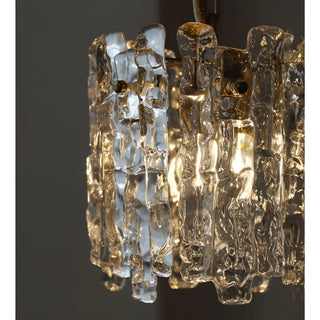 Close-up detail of handcrafted Murano glass panels with organic textured finish