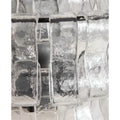 Close-up detail of clear Murano glass panels on a modern Italian wall sconce with textured handcrafted art glass