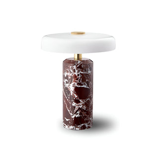Decorative lamp with violet red marble top and brown marbled base on a white background