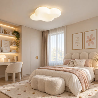 Nuvielle cloud ceiling light above a blush upholstered bed