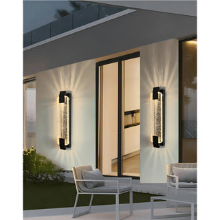 Pair of LED crystal outdoor wall sconces lighting up a stylish patio