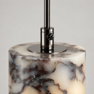 Detail of the black canopy, rod and marble shade connection of the Pietrara pendant light
