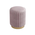 Pink velvet vanity stool with gold accent base — elegant Scandinavian-style makeup seat