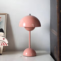 Portable rechargeable mushroom table lamp in soft peach pink finish for stylish interiors