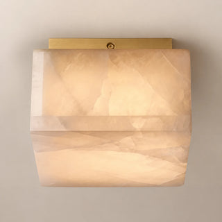 Quadara square alabaster flush mount ceiling light with a brushed brass bracket, front studio view