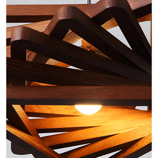 Close-up of the LED bulb inside the wooden spiral frame of the Roquesteron pendant light