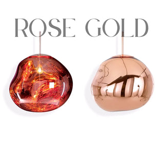 Rose gold pendant lights with molten and mirrored glass finishes, perfect for warm modern interiors