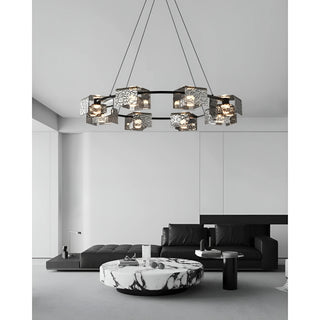 luxury round chandelier with textured glass over marble coffee table