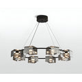 round copper chandelier with textured glass shades and black metal frame
