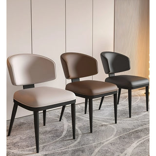 Set of three modern luxury dining chairs in off-white, brown, and black colors
