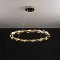 Single-ring modern K9 crystal chandelier emitting warm LED light, perfect for minimalist home decor