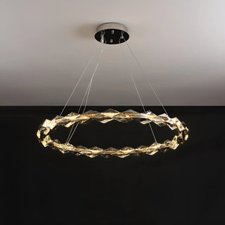 Single-ring modern K9 crystal chandelier emitting warm LED light, perfect for minimalist home decor
